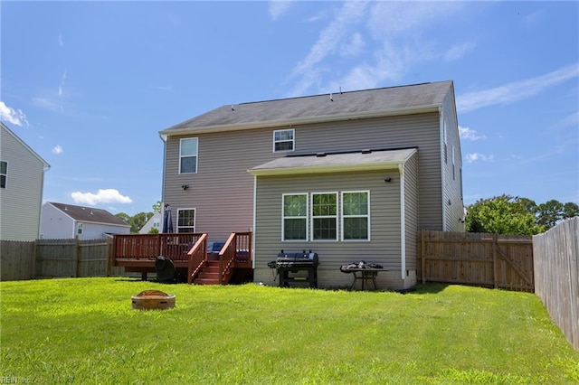 180 Avon Rd, Hampton, VA 23666 - rear view of property featuring a fire pit, a deck, and a fenced backyard