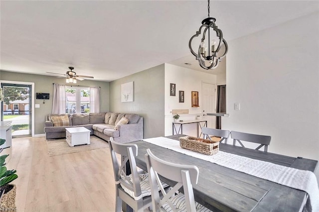 1256 Etworth Ln, Virginia Beach, VA 23464 - dining area featuring light wood-type flooring, a chandelier, and ceiling fan