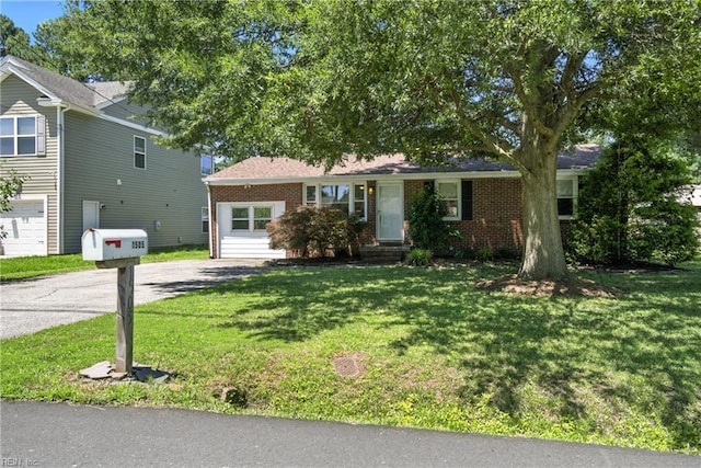 1505 Hawthorne Dr, Chesapeake, VA 23325 - ranch-style home featuring brick siding, a front yard, and asphalt driveway