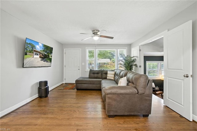 1505 Hawthorne Dr, Chesapeake, VA 23325 - living area featuring a ceiling fan and wood finished floors