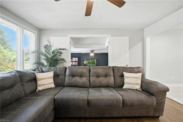 1505 Hawthorne Dr, Chesapeake, VA 23325 - living area with ceiling fan and wood finished floors