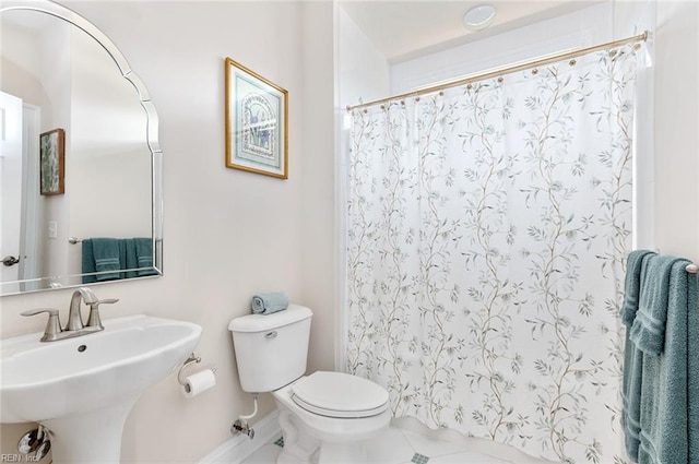 3033 N James Dr, Suffolk, VA 23435 - bathroom featuring a shower with curtain and tile patterned floors