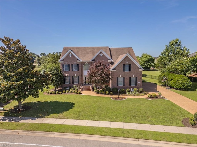 3033 N James Dr, Suffolk, VA 23435 - view of front of property with a front lawn and brick siding