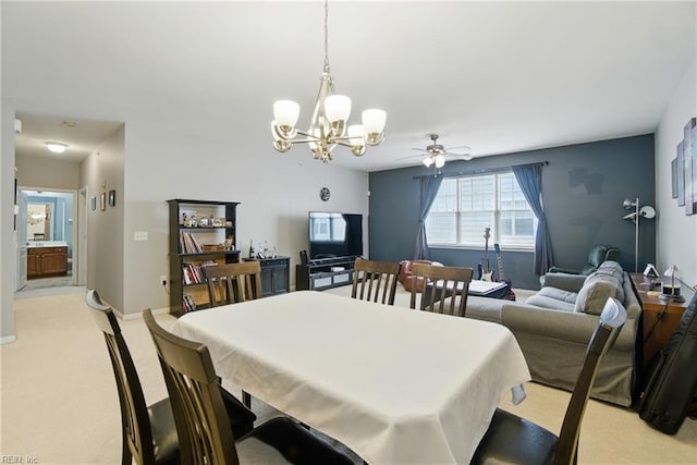 924 Southmoor Dr Unit 204, Virginia Beach, VA 23455 - dining area with a chandelier, light carpet, and a ceiling fan