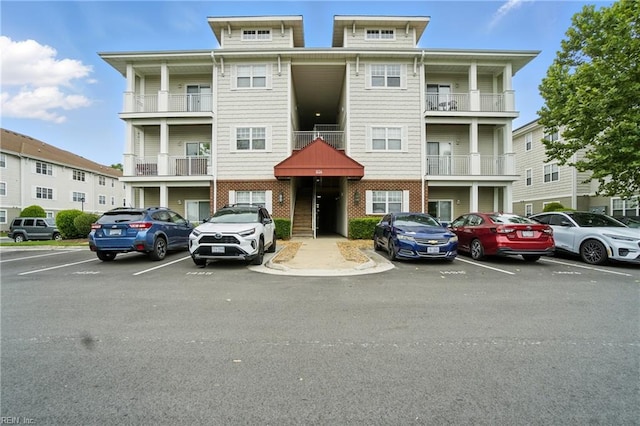 924 Southmoor Dr Unit 204, Virginia Beach, VA 23455 - view of property featuring uncovered parking