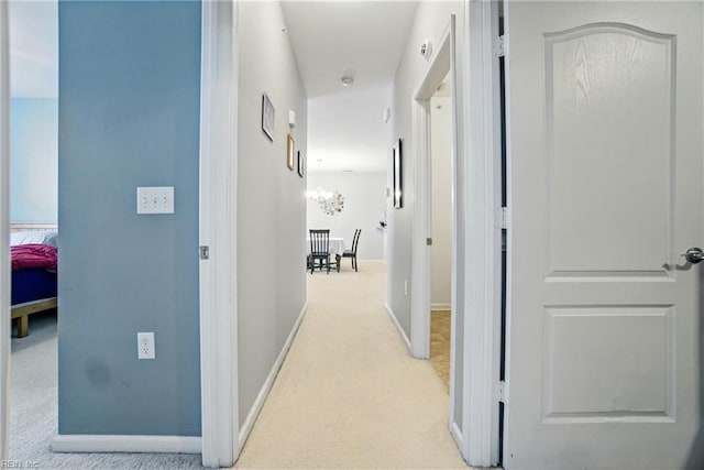 924 Southmoor Dr Unit 204, Virginia Beach, VA 23455 - hallway with carpet floors and baseboards