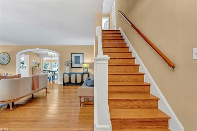 241 Sir Oliver Rd, Norfolk, VA 23505 - stairs with wood finished floors and arched walkways