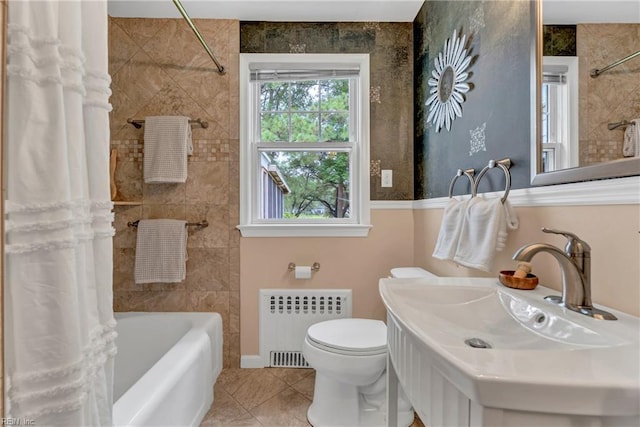 241 Sir Oliver Rd, Norfolk, VA 23505 - full bathroom featuring radiator, tile patterned flooring, and shower / tub combo