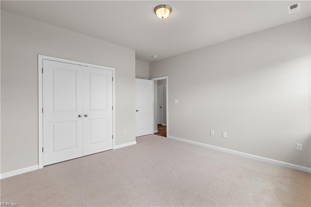1015 Hillpoint Rd, Suffolk, VA 23434 - unfurnished bedroom with carpet and a closet