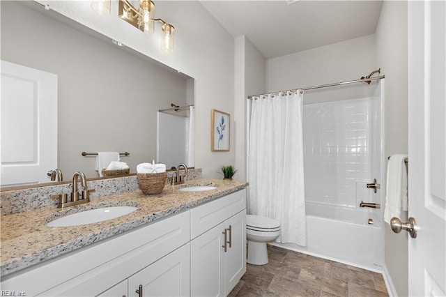 1015 Hillpoint Rd, Suffolk, VA 23434 - bathroom with double vanity, shower / bath combo with shower curtain, and stone finish flooring