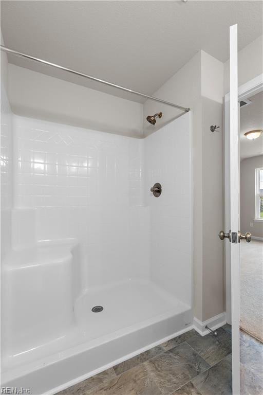 1015 Hillpoint Rd, Suffolk, VA 23434 - bathroom with a shower and baseboards