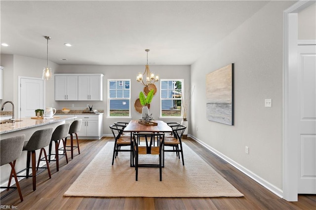 1015 Hillpoint Rd, Suffolk, VA 23434 - dining space featuring recessed lighting, wood finished floors, and a chandelier