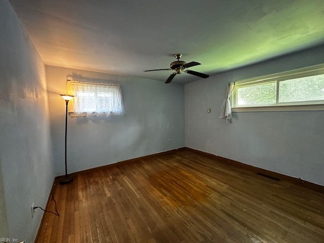 565 River Creek Rd, Chesapeake, VA 23320 - unfurnished room featuring dark wood-style floors and a ceiling fan