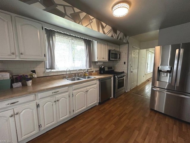 565 River Creek Rd, Chesapeake, VA 23320 - kitchen featuring stainless steel appliances, white cabinetry, decorative backsplash, and dark wood-style floors