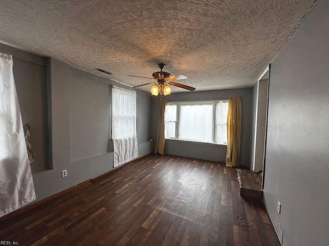 565 River Creek Rd, Chesapeake, VA 23320 - unfurnished room featuring wood finished floors, a textured ceiling, and a ceiling fan