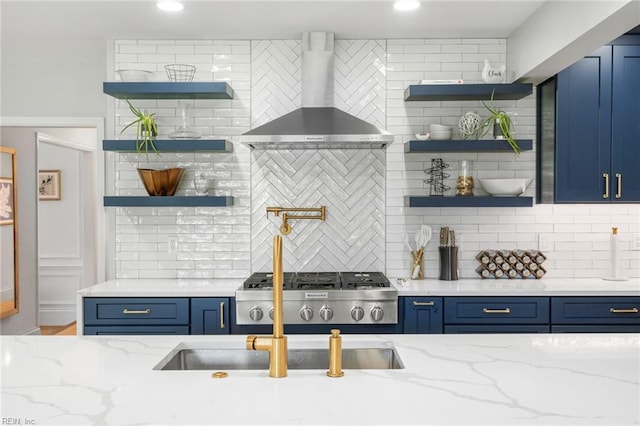 6070 Newport Pt, Norfolk, VA 23505 - kitchen with open shelves, wall chimney range hood, blue cabinetry, backsplash, and recessed lighting