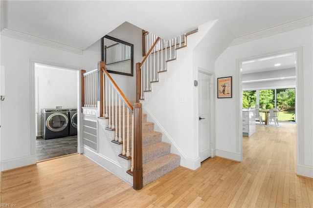 6070 Newport Pt, Norfolk, VA 23505 - stairway with independent washer and dryer, hardwood / wood-style floors, and ornamental molding