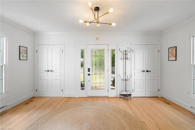 6070 Newport Pt, Norfolk, VA 23505 - foyer with light wood finished floors and a chandelier