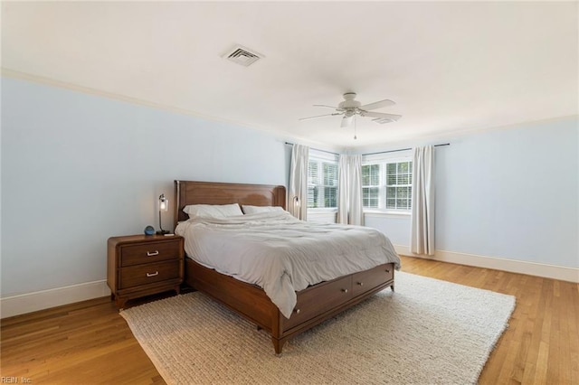 6070 Newport Pt, Norfolk, VA 23505 - bedroom with light wood-style floors and a ceiling fan