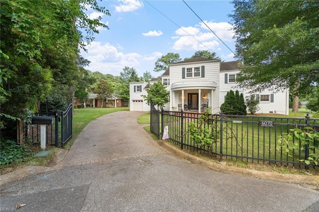 6070 Newport Pt, Norfolk, VA 23505 - view of front of property featuring asphalt driveway and a garage