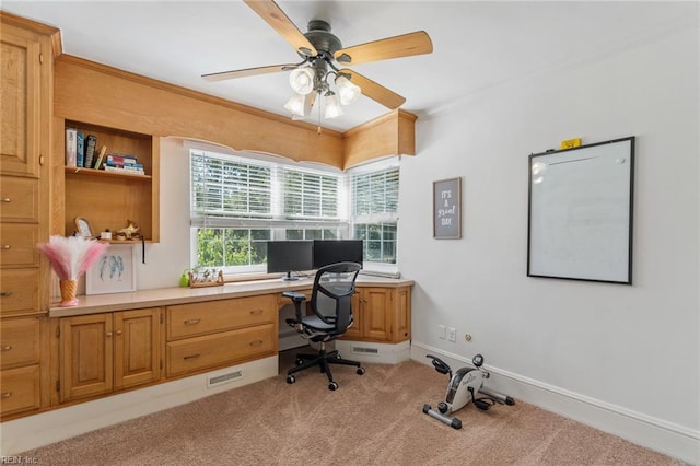 6070 Newport Pt, Norfolk, VA 23505 - office area with light colored carpet, a ceiling fan, built in study area, and ornamental molding