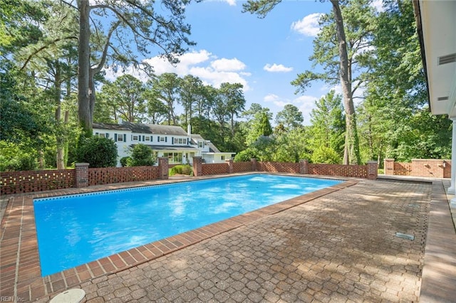 6070 Newport Pt, Norfolk, VA 23505 - view of pool with view of wooded area and a patio