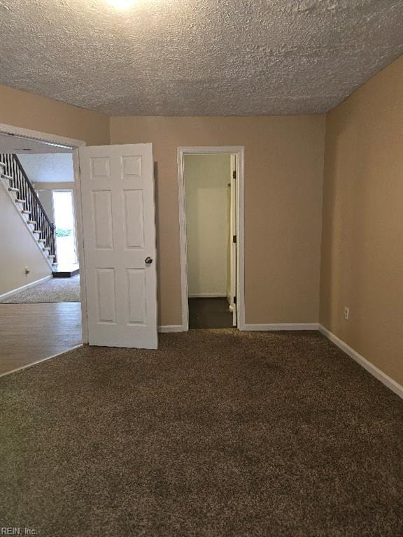 238 Susan Constant Dr, Newport News, VA 23608 - carpeted spare room featuring stairway and a textured ceiling
