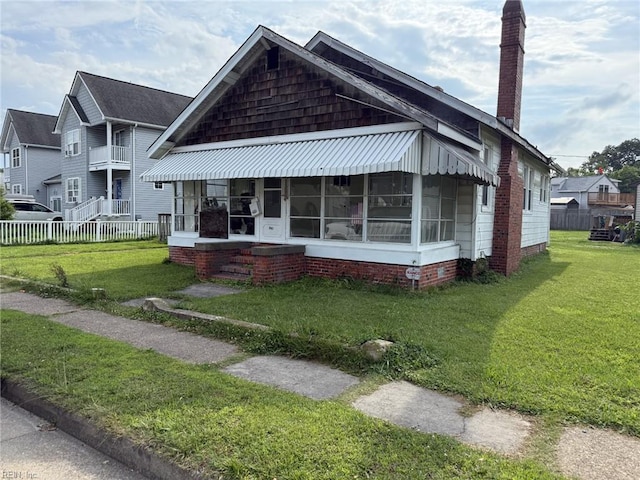 261 N First St, Hampton, VA 23664 - view of front of home featuring a chimney