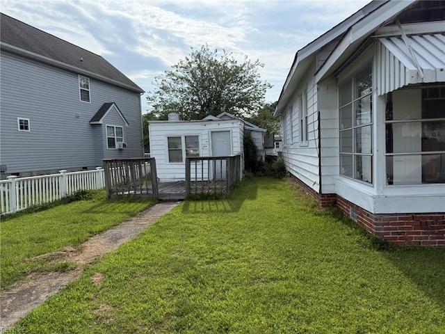 261 N First St, Hampton, VA 23664 - view of yard featuring a wooden deck and an outdoor structure