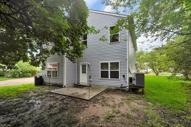 1332 Fishermans Rd, Norfolk, VA 23503 - back of house featuring a yard and a patio area