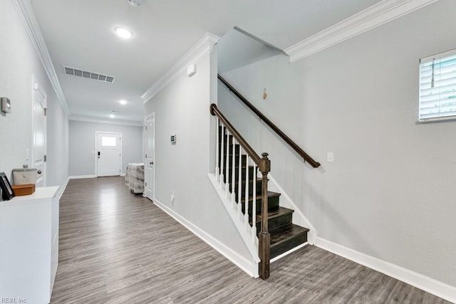 1332 Fishermans Rd, Norfolk, VA 23503 - stairs with ornamental molding, wood finished floors, and recessed lighting