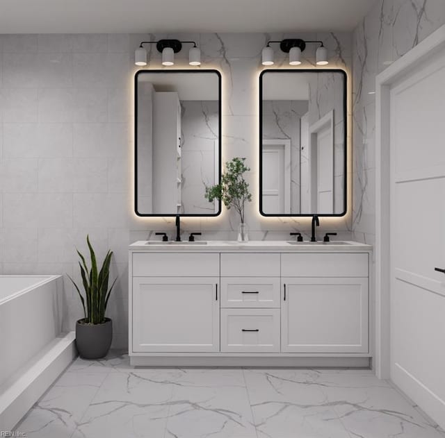 0 Kings Point Ave, Smithfield, VA 23430 - bathroom with marble look tile flooring, double vanity, and a tub