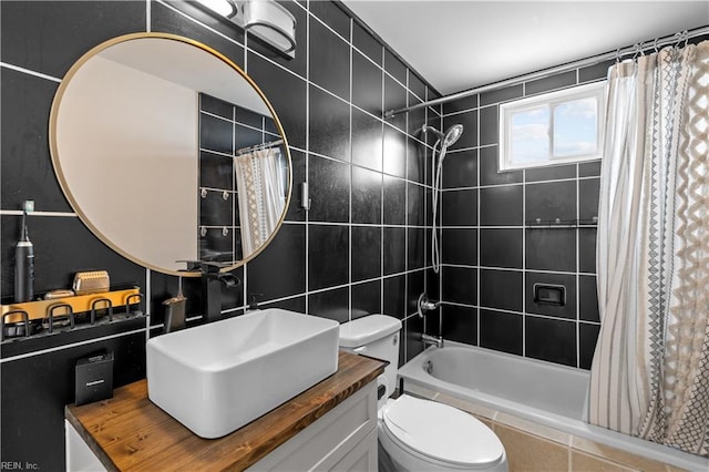 2320 Early St, Norfolk, VA 23513 - full bathroom with tiled shower / bath, vanity, and tile walls