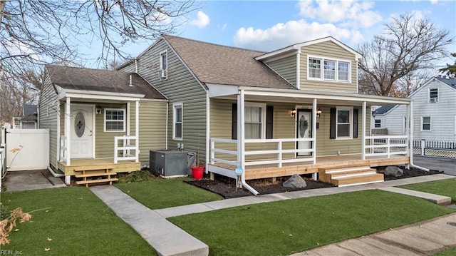 2320 Early St, Norfolk, VA 23513 - view of front of home with a porch, a shingled roof, and a gate