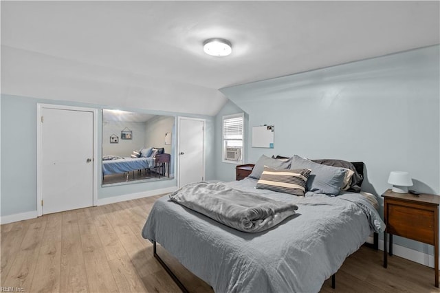2320 Early St, Norfolk, VA 23513 - bedroom with lofted ceiling and light wood-type flooring