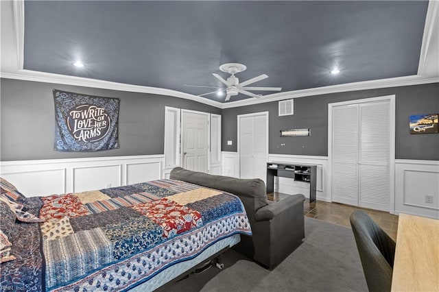2320 Early St, Norfolk, VA 23513 - bedroom featuring crown molding, wainscoting, multiple closets, a decorative wall, and recessed lighting