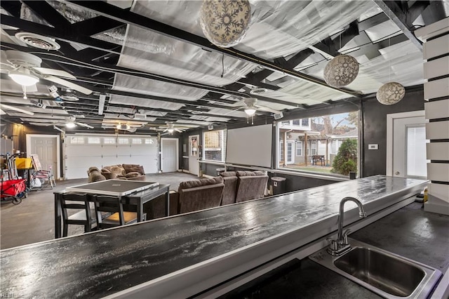 2320 Early St, Norfolk, VA 23513 - kitchen with ceiling fan and concrete floors