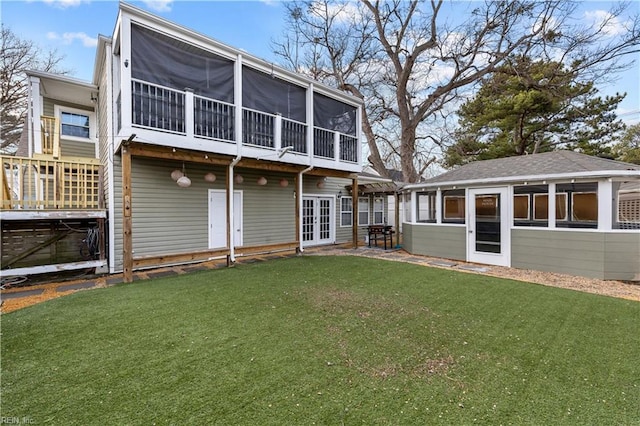 2320 Early St, Norfolk, VA 23513 - rear view of house featuring french doors, a sunroom, and a yard