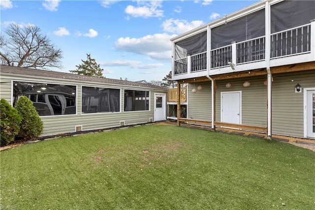 2320 Early St, Norfolk, VA 23513 - back of property featuring a sunroom and a yard