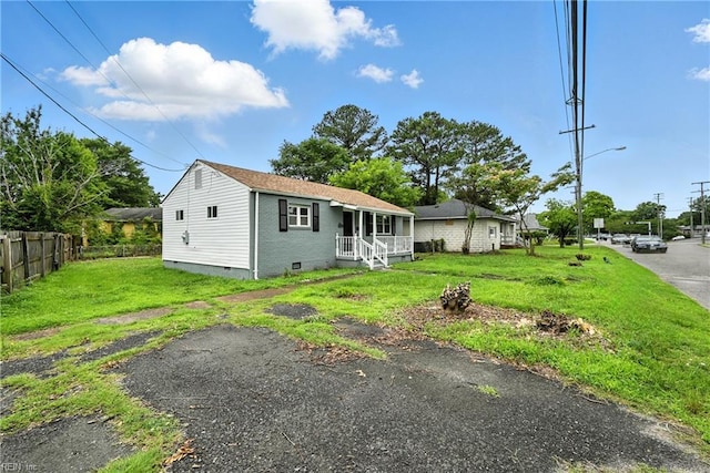 2214 Berkley Ave, Chesapeake, VA 23324 - view of front facade with crawl space and a porch