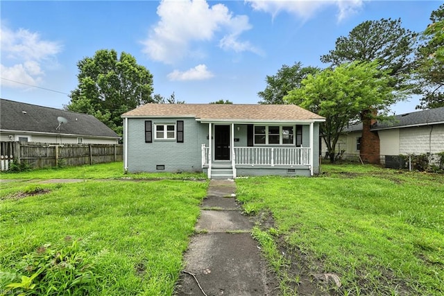 2214 Berkley Ave, Chesapeake, VA 23324 - view of front of house with crawl space, a porch, and brick siding