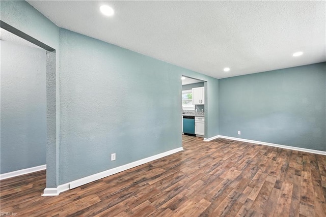 2214 Berkley Ave, Chesapeake, VA 23324 - unfurnished room featuring dark wood-type flooring, recessed lighting, and a textured ceiling
