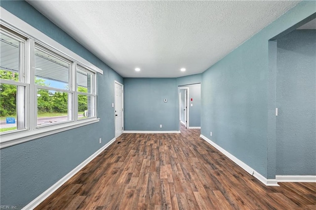 2214 Berkley Ave, Chesapeake, VA 23324 - spare room featuring wood finished floors, a textured ceiling, and recessed lighting