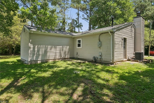 433 Queens Creek Rd, Williamsburg, VA 23185 - rear view of property with a yard and a chimney