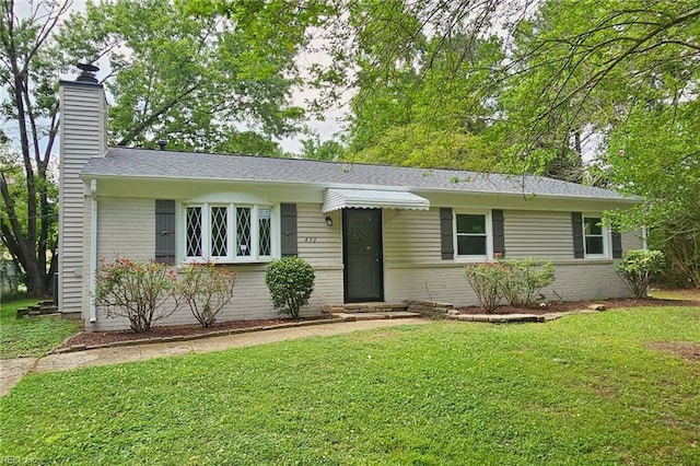 433 Queens Creek Rd, Williamsburg, VA 23185 - ranch-style home featuring a chimney, brick siding, and a front lawn