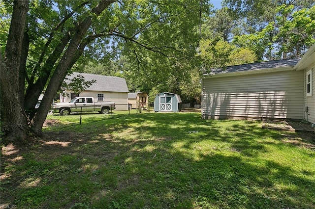 433 Queens Creek Rd, Williamsburg, VA 23185 - view of yard with a storage unit