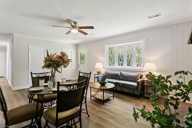433 Queens Creek Rd, Williamsburg, VA 23185 - dining room with a ceiling fan, wood finished floors, and ornamental molding