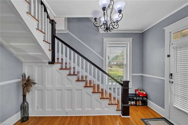 118 Saint James Ave, Suffolk, VA 23434 - entrance foyer with stairs, wood finished floors, and a chandelier