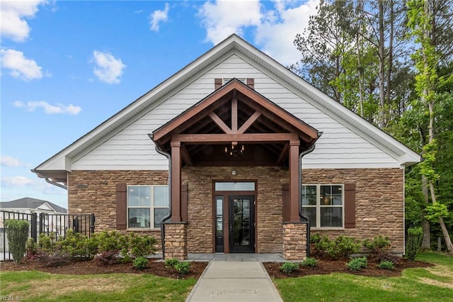 1506 Kathy Ann Way E, Carrollton, VA 23314 - view of exterior entry with stone siding