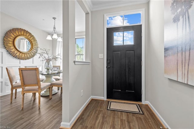 1003 Kathy Ann Way E, Carrollton, VA 23314 - entrance foyer featuring wood finished floors and ornamental molding